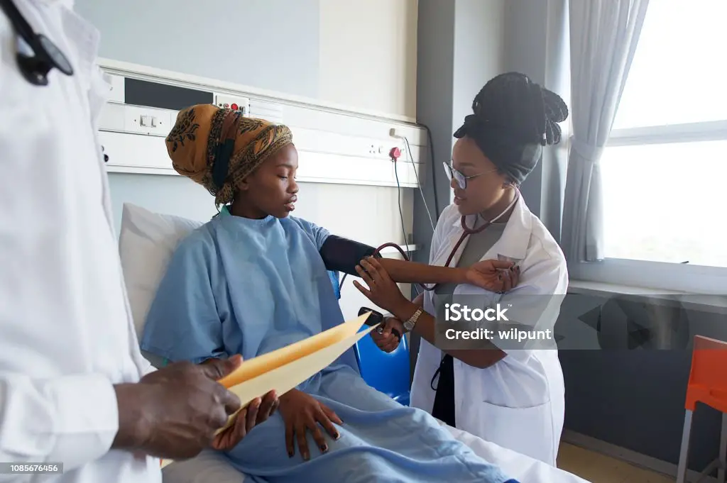 Healthcare workers providing HIV treatment South Africa at a local clinic"